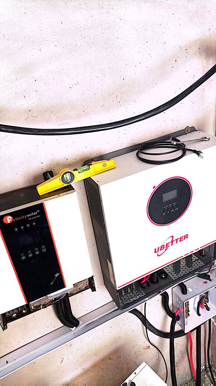 Inverter being levelled during installation